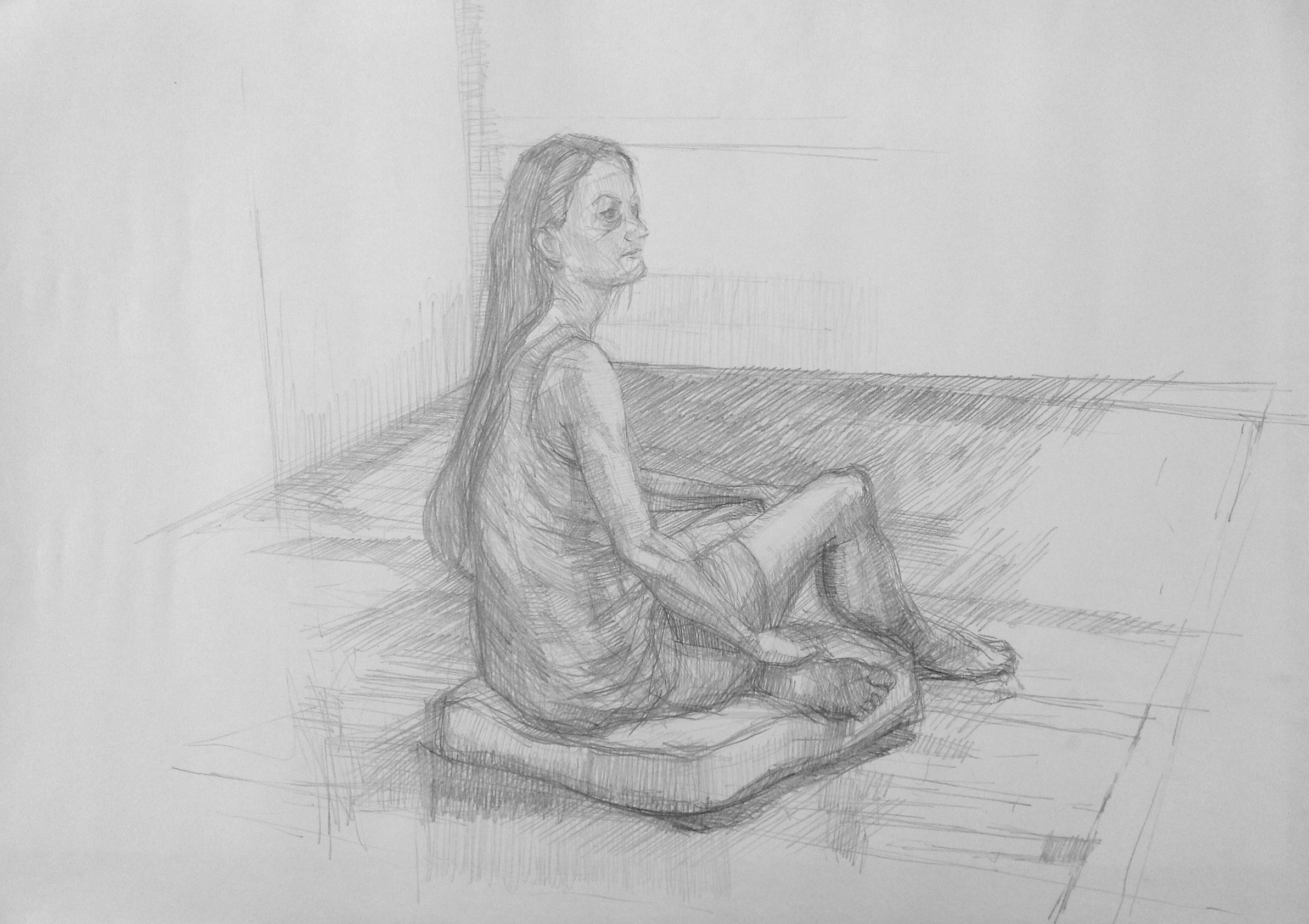 Pencil drawing of a seated woman